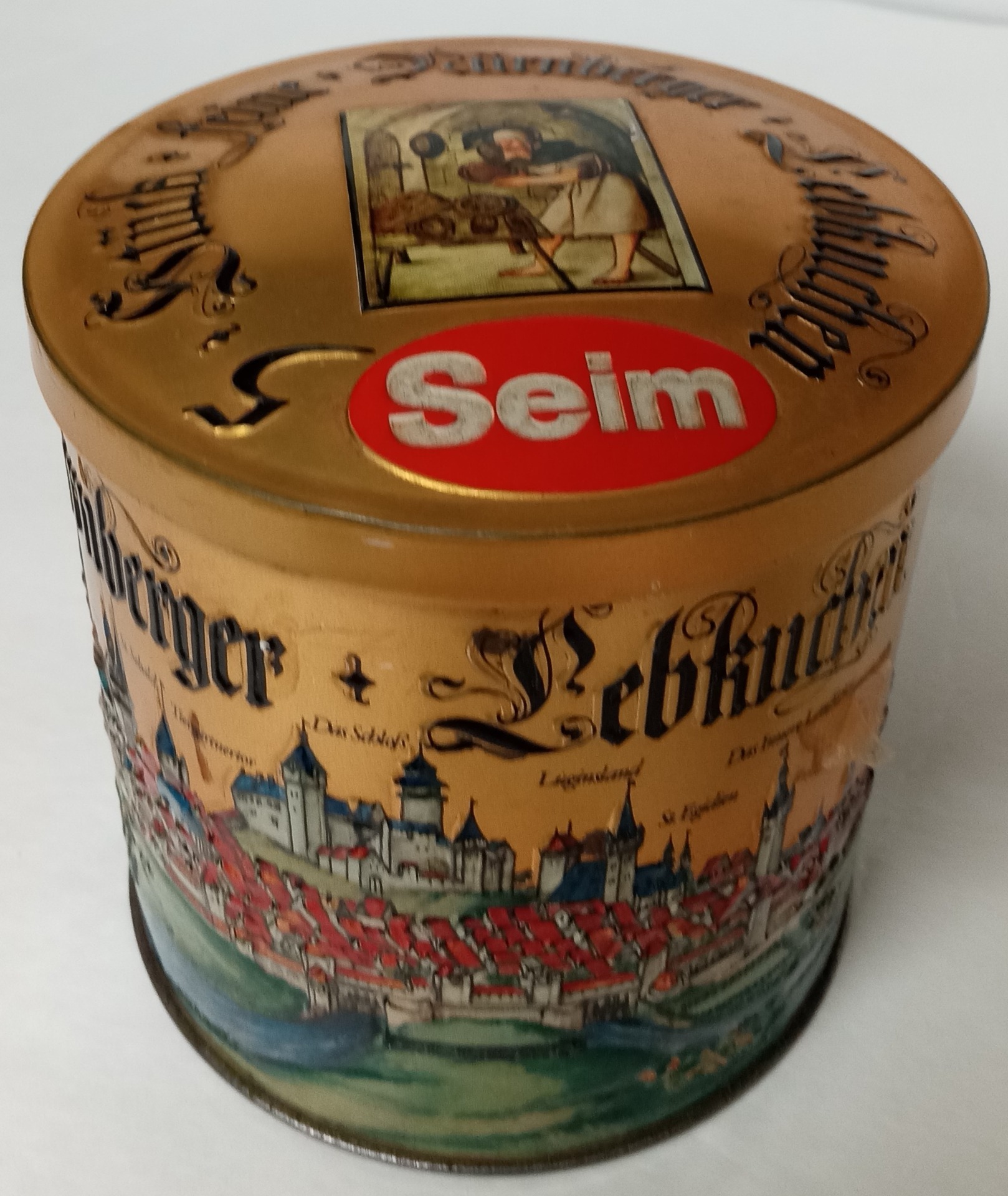 These 2 tins are the same design, but the construction is different.