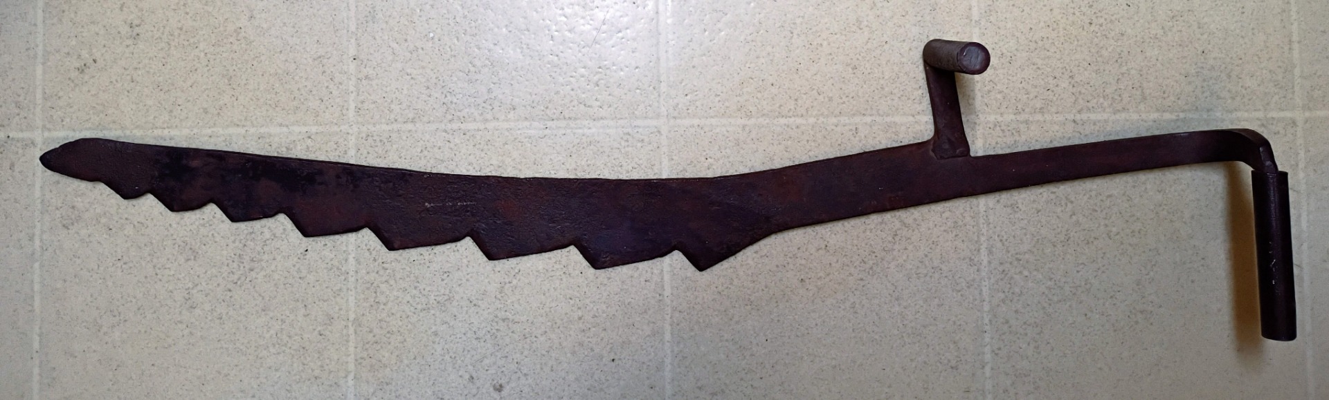 a very heavy saw of iron! (34" X 6 1/2"; $5.00)
