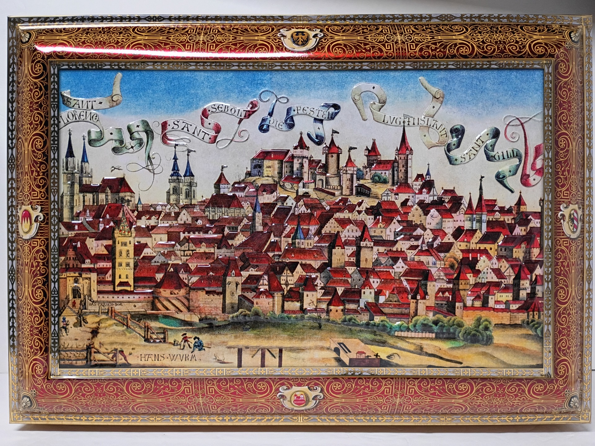 2025 - #70 (red) (Similar to 1980, but with a few design changes.)  [Was also Lebkuchen Schmidt's GIFT CHEST in 2015.]